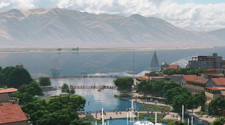 Aerial view of a lagoon resort against the mountains